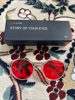 Blue Light Clear frame glasses with orange lenses
